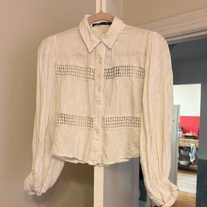 Oh Boy! White long sleeve viscose button down w/back key hole cut out. Size S